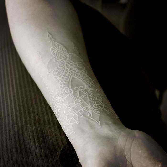 30 White Tattoo Designs That Look Like Magic Runes