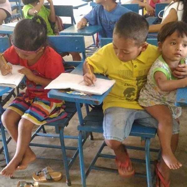 Boy takes responsibility for his little sister and brings her to school so he doesn’t have to miss out on his education.